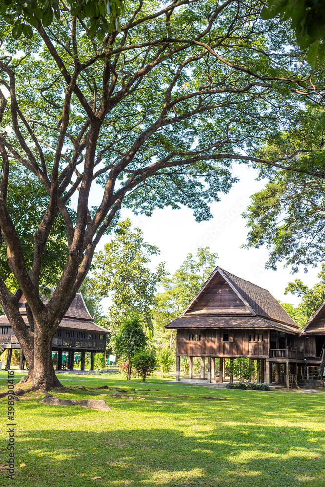 Traditional wooden Thai house in the park, Old Thai house museum in North of Thailand, Thai architecture Traditional wooden Thai house in the park, Old Thai house museum in North of Thailand, Thai architecture