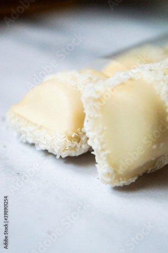 Coconut covered and filled chocolate bar