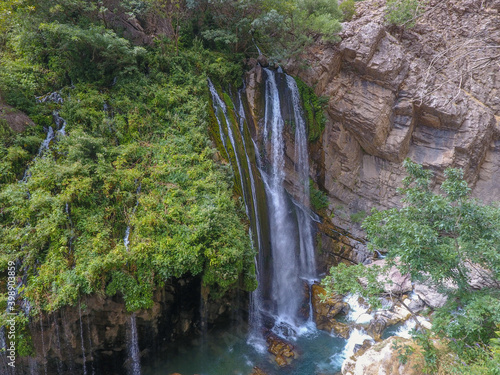 waterfall flowing in nature, cascade, cascade between rocks. Hakkari in Turkey
