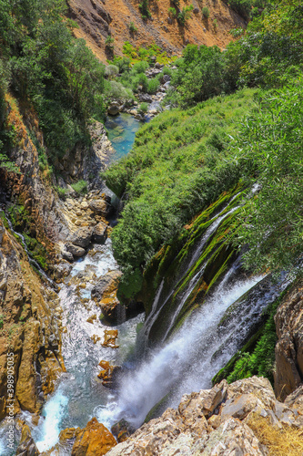 waterfall flowing in nature, cascade, cascade between rocks. Hakkari in Turkey
