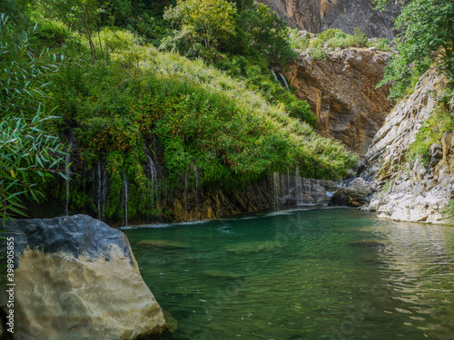 waterfall flowing in nature, cascade, cascade between rocks. Hakkari in Turkey 