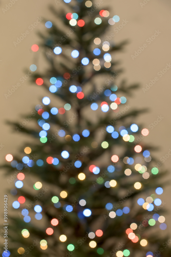 Blurred decorated Christmas tree on white background. Blurred decorated Christmas tree on white background.