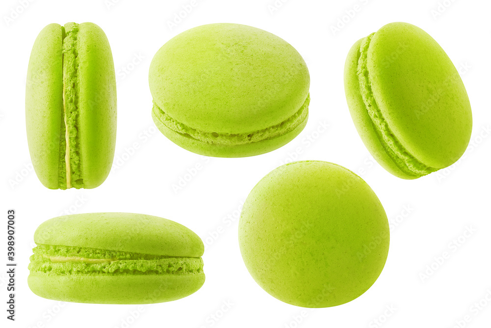 Isolated green macarons collection. Pistachio or green tea macaroon at different angles isolated on white background Isolated green macarons collection. Pistachio or green tea macaroon at different angles isolated on white background