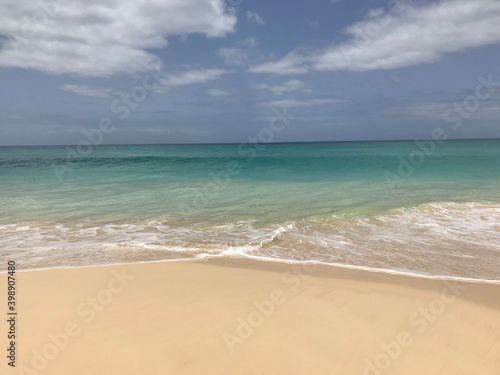 Beautiful Sandy beach blue sky and turquoise sea