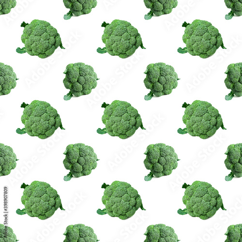 Seamless pattern with vivid green bunchs of broccoli on white background. Vegetable abstract seamless pattern.