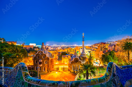 Night time view of Barcelona seen from Park Guell. Park was built from 1900 to 1914 and officially opened as a public park in 1926. In 1984 UNESCO declared the park a World Heritage Site