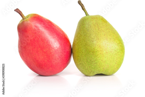 Fresh pears, one and a half yellow fruit isolated on white background