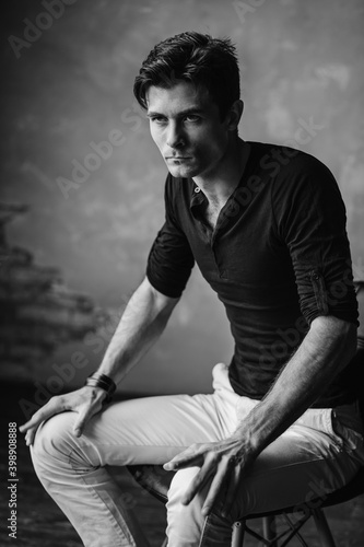 Portrait of a handsome young man. Studio photography. Loft © algrigo