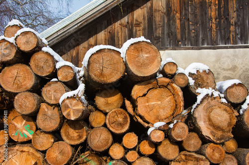 fire wood tree on a farmhouse in winter