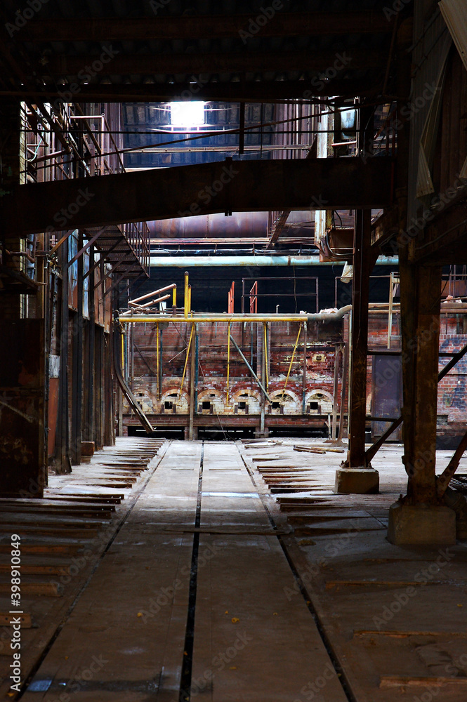 Rail lines and kilns in an abandoned brickworks plant