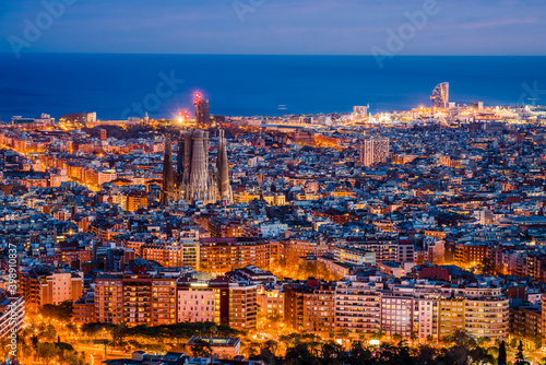 Aerial view of Barcelona city centre at dusk. Spain