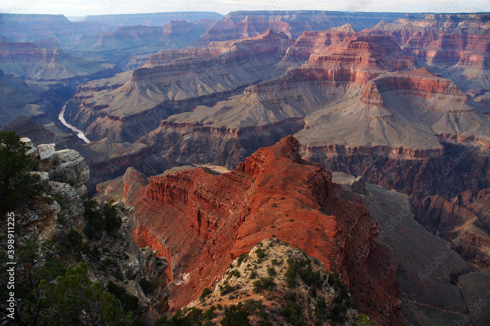 Red mesa and the colorado river carving through the Grand Canyon