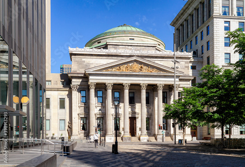 Bank of Montreal Museum in Popular Place d'Armes, in front of Notre dame Cathedral, Montreal, Quebec, Canada photo