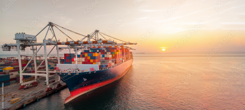 Crane loading cargo container to container ship stand by in the international terminal logistic sea port concept freight smart shipping by ship at sunset, webinar banner, crane working near sea Stock Photo | Crane loading cargo container to container ship stand by in the international terminal logistic sea port concept freight smart shipping by ship at sunset, webinar banner, crane working near sea Stock Photo |