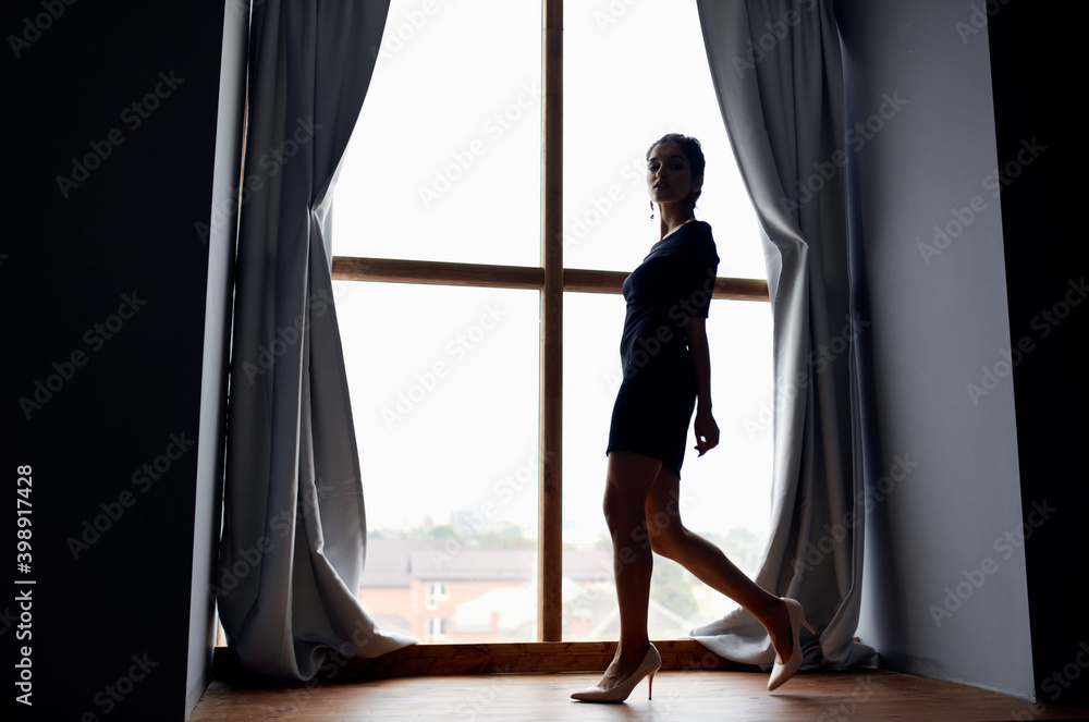 women on wide windowsill full length and curtains model evening dress women on wide windowsill full length and curtains model evening dress