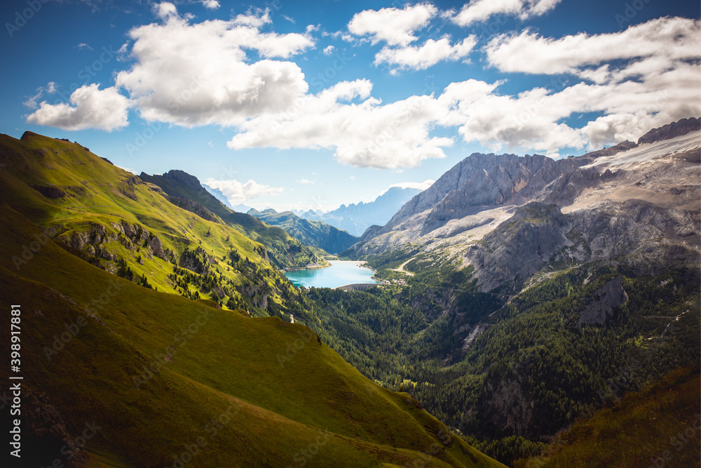 Fedaia Lake in Italian Dolomites, summertime, travel, hikong