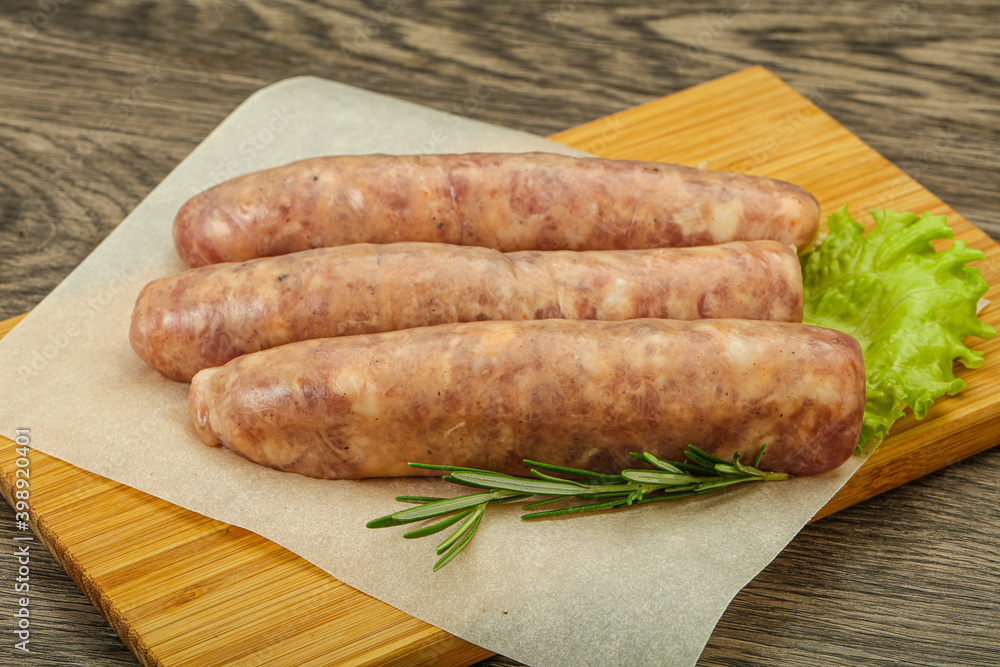 Raw pork meat sausages for grill Raw pork meat sausages for grill