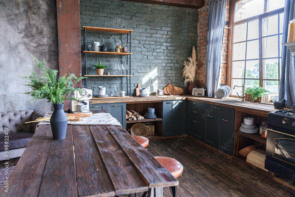 Scandinavian classic minimalistic dark gray kitchen with wooden details. Stylish loft modern gray kitchen decoration with clean contemporary style interior design. Scandinavian classic minimalistic dark gray kitchen with wooden details. Stylish loft modern gray kitchen decoration with clean contemporary style interior design.