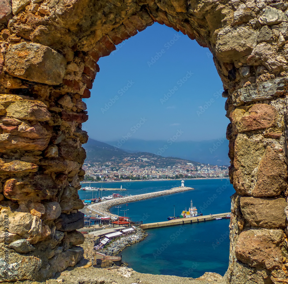 A framed view from the castle towards the city of Alanya Turkey in the summertime