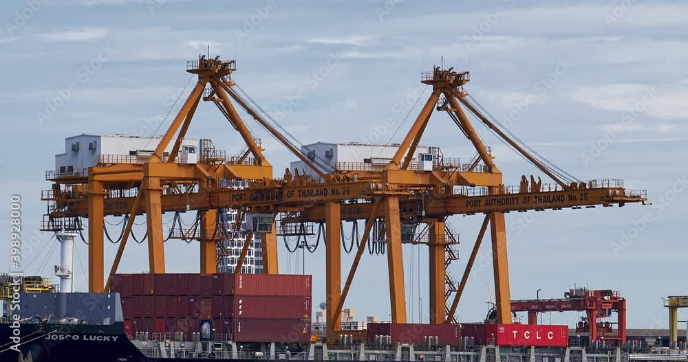 Bangkok , Bangkok province, Thailand - December 2, 2020 - Time lapse of cargo unloading containers . Bangkok , Bangkok province, Thailand - December 2, 2020 - Time lapse of cargo unloading containers .