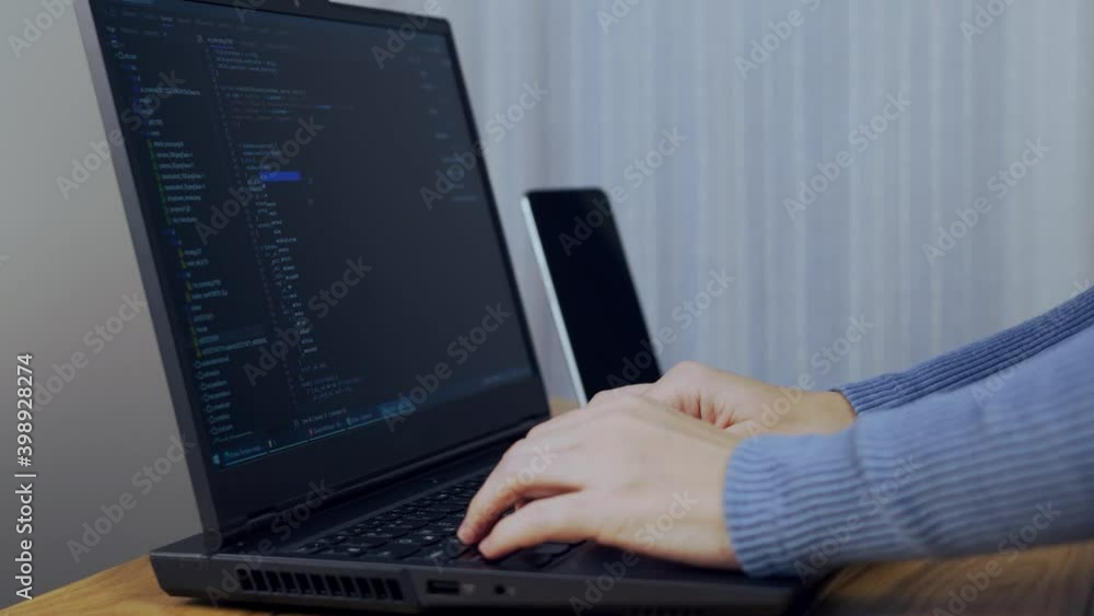 Close-up of the Female Software Developer Debugger Process. A System Programmer Writes Code. Close-up of the Female Software Developer Debugger Process. A System Programmer Writes Code.