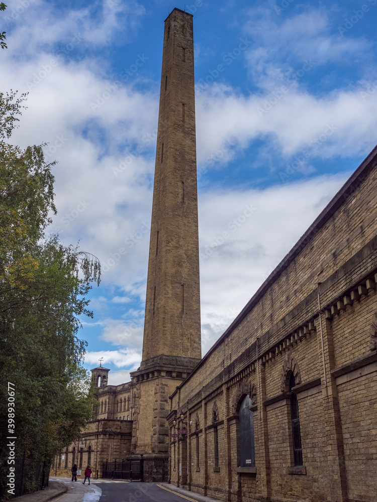 Large mill chimney at salts mill, saltaire, bradford, yorkshire, uk