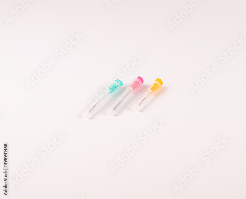 Disposable syringe needles, various sizes, for intramuscular, subcutaneous, intravenous, intraarterial injections. photo