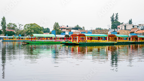 Coloridas trajineras en Xochimilco Ciudad de México photo