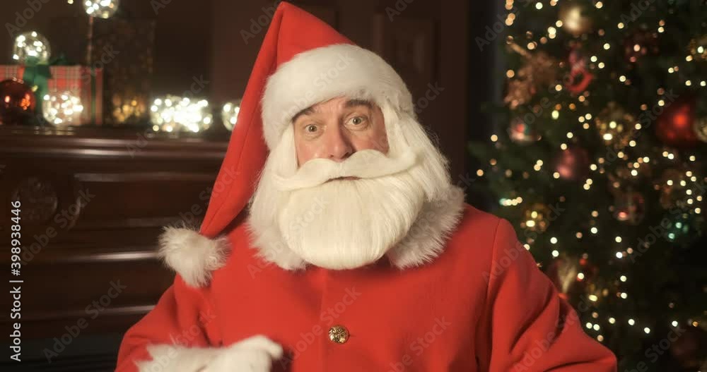 Emotional Santa Claus talking on a laptop online. Remote communication of happy people. Group video call. Holiday background. Virtual meeting during pandemic. Greeting Merry Christmas Emotional Santa Claus talking on a laptop online. Remote communication of happy people. Group video call. Holiday background. Virtual meeting during pandemic. Greeting Merry Christmas