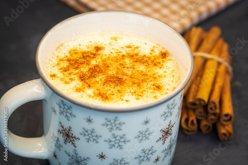 Close up white cup of salep...