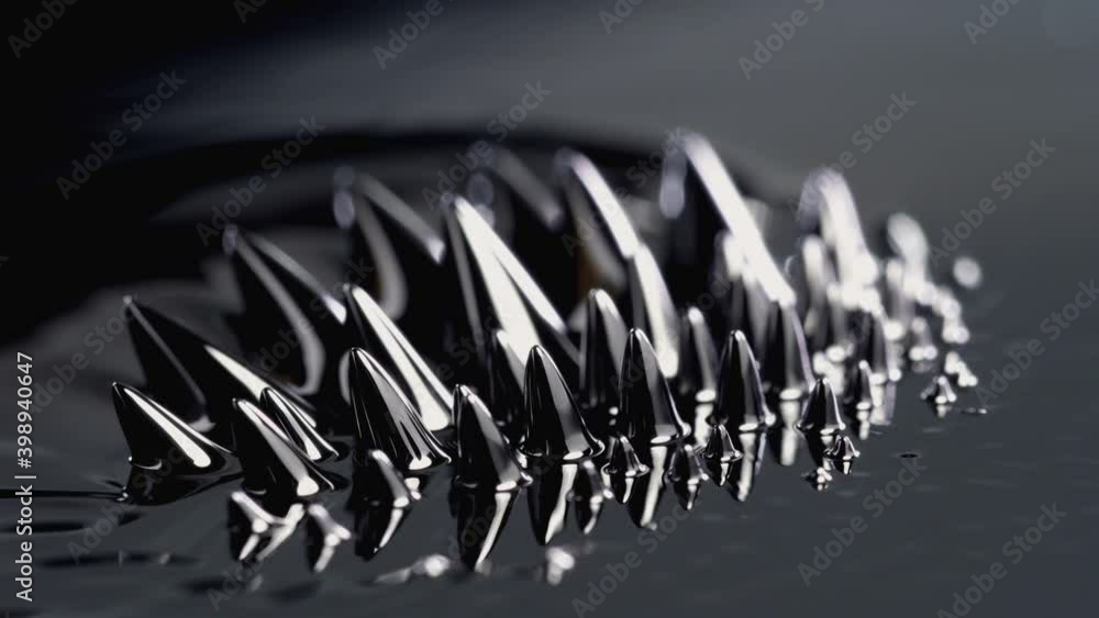 Ferrofluid. Black liquid surface. Abstract background. Ferrofluid. Black liquid surface. Abstract background.