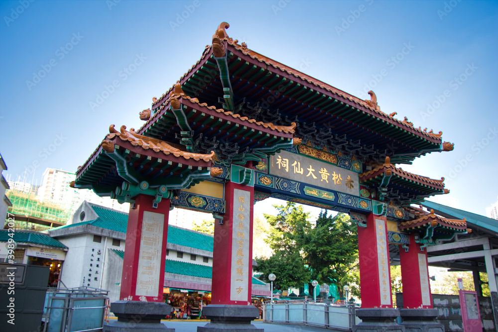 Kowloon, Hong Kong - 02.12.2020 : traditional Chinese architecture, Religion gate near Wong Tai Sin Temple, Buddhist and Taoist temple Kowloon, Hong Kong - 02.12.2020 : traditional Chinese architecture, Religion gate near Wong Tai Sin Temple, Buddhist and Taoist temple