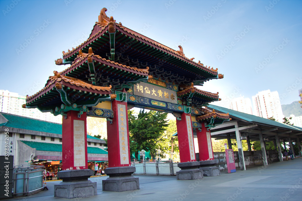 Kowloon, Hong Kong - 02.12.2020 : traditional Chinese architecture, Religion gate near  Wong Tai Sin Temple, Buddhist and Taoist temple