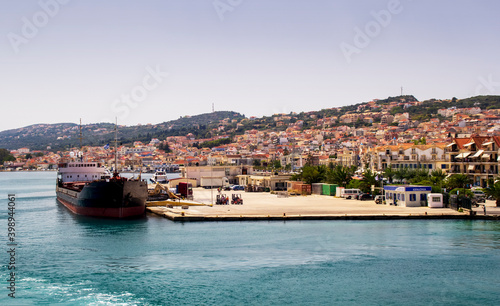 Ship docked in a greek port waiting to be loaded.