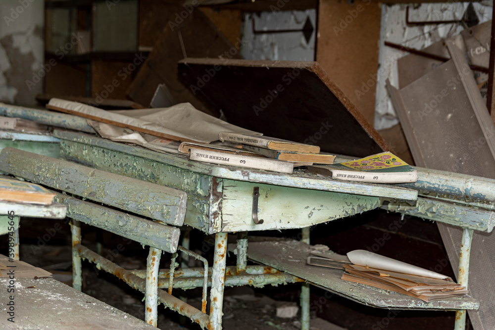 School desks in the classroom of an abandoned school in the Chernobyl exclusion zone School desks in the classroom of an abandoned school in the Chernobyl exclusion zone