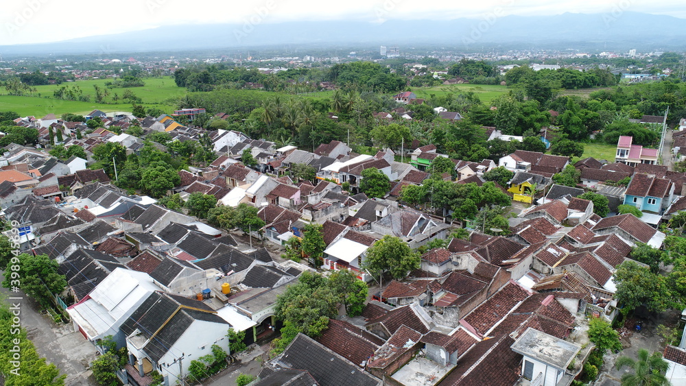 Residential road area taken using a drone. Beautiful streets that look comfortable to use for morning jogging or casual sports or just for a leisurely walk with family.