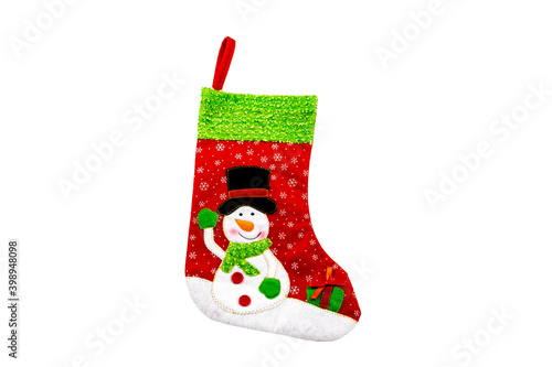 Christmas decorative stocking for gifts. New Year`s socks and toys.