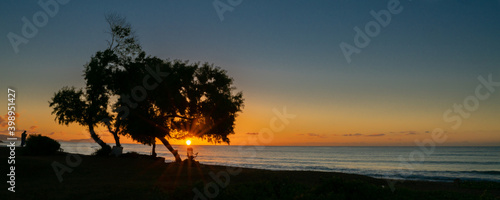 Vivid and dynamic sunrises at beaches on Oahu Hawaii tropical serene ocean scenes and island breezes.