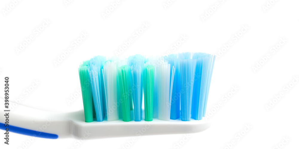 Toothbrush head close-up view, isolated on white background, macro Toothbrush head close-up view, isolated on white background, macro