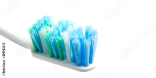 Toothbrush head close-up view  isolated on white background  macro