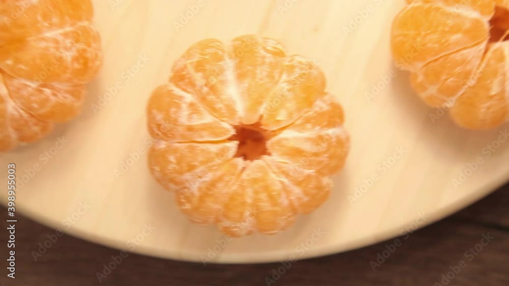 fresh tangerines spinning on the board fresh tangerines spinning on the board