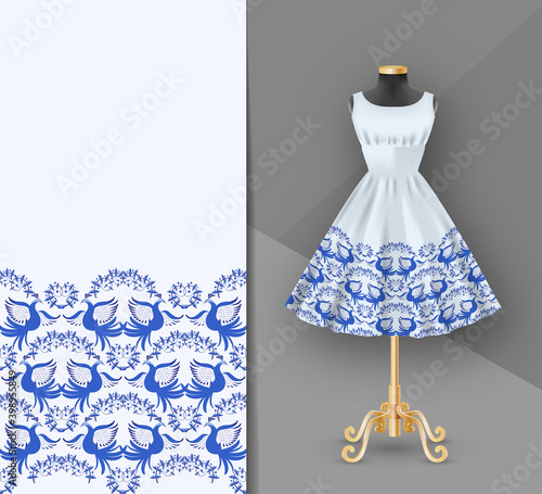 Fashion embroidery fabric printed dress on a black mannequin. Dress clothes realistic 3d mock up. Seamless blue Flower pattern in ethnic painting style.