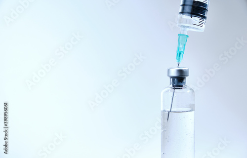 syringe and vials. Vaccine for coronavirus on white background.