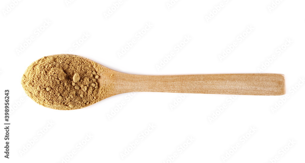 Ginger powder in wooden spoon isolated on white background, top view, (Zingiber officinale) Ginger powder in wooden spoon isolated on white background, top view, (Zingiber officinale)