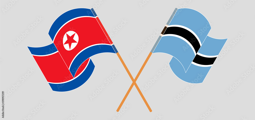 Crossed and waving flags of North Korea and Botswana Crossed and waving flags of North Korea and Botswana