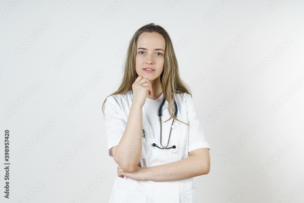 Medicine and health concept. The doctor shows his muscles, demonstrating success. Medicine and health concept. The doctor shows his muscles, demonstrating success.