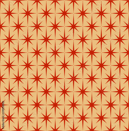 Mid-century modern wrapping paper with starburst pattern with orange-red stars on cream background.