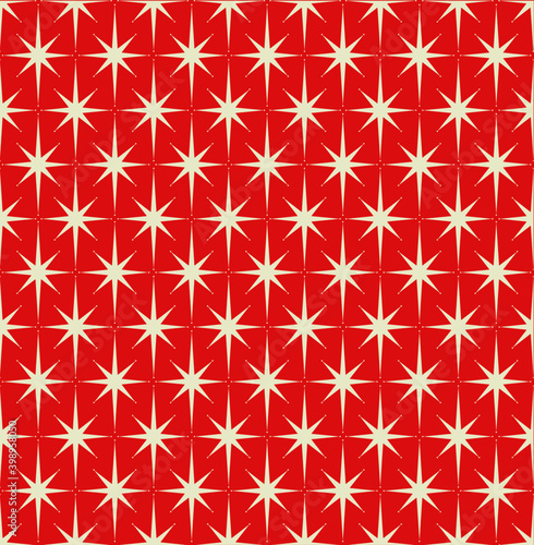Mid-century modern wrapping paper with starburst pattern with cream stars on red background