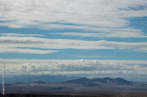 Desert landscape under a cloudy sky