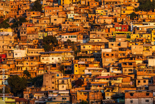 Close-up view of a favela at sunset